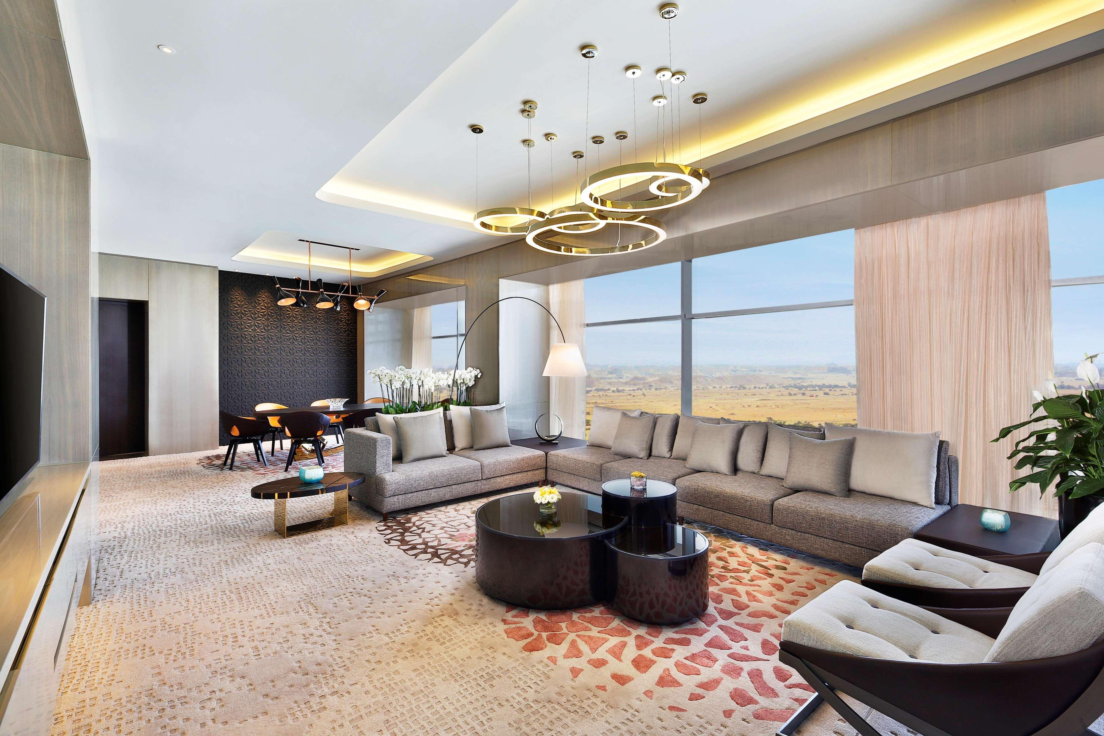 Alrayyan Hotel Doha, Curio Collection By Hilton Al Rayyan Экстерьер фото The living room of a three-bedroom suite